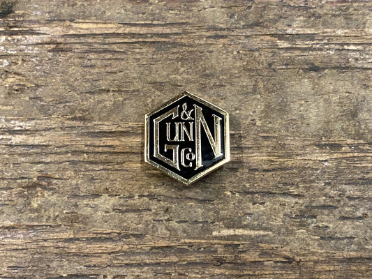 Gunn & Co Gold And Black Enamel Lapel Pin Badge. Badge