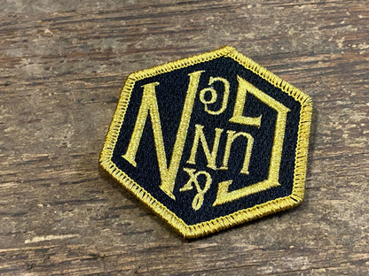 Gunn & Co Gold And Black Embroidered Cloth Badge. Badge