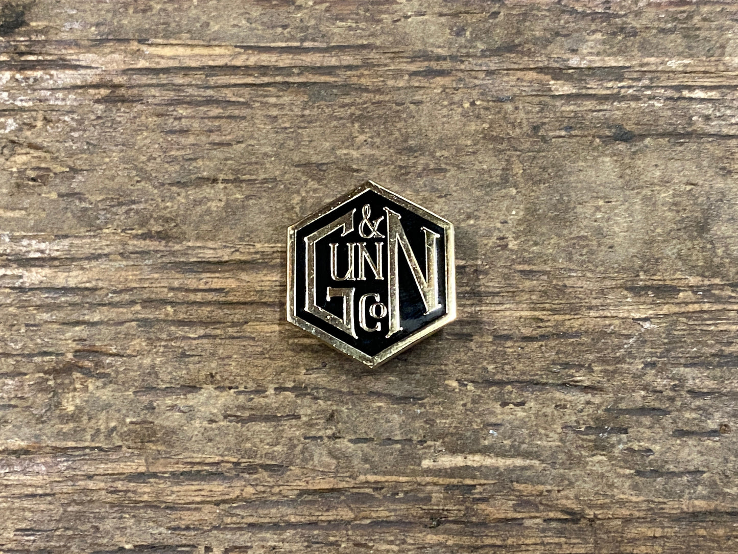 Gunn & Co Gold And Black Enamel Lapel Pin Badge. Badge
