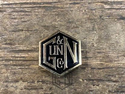 Gunn & Co Gold And Black Enamel Lapel Pin Badge. Badge